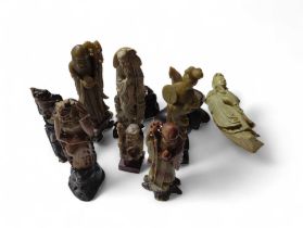 A group of carved soapstone figures of Deities and