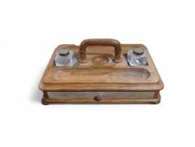 An Edwardian wooden desk stand