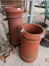 A chimney garden ornament, 61cm high and another s
