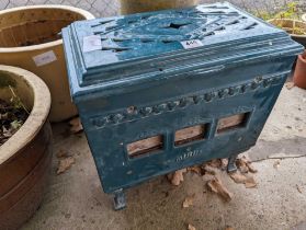 A teal coloured Mirus stove, approximately 50cm hi