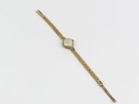 A ladies 9ct gold Corvette wrist watch, on a brock