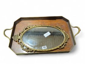 A rectangular oak and brass galleried tray and a d