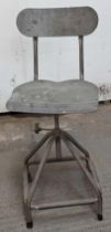 A mid-20th century machinists chair, on four legs