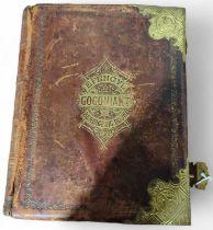 A large leather Welsh Bible with decorative gilt b