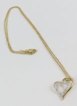 A double heart pendant set with diamonds,