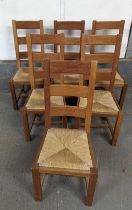 A set of six modern rush seated dining chairs