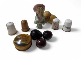 A vegetable ivory acorn shaped thimble holder; a s