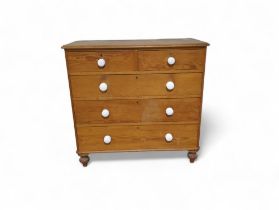 A Victorian pine chest of two short and three long