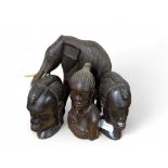 An African carved hardwood figure of an elephant t