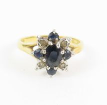 An 18ct gold sapphire and diamond flower type clus