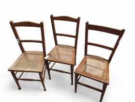 Three cane seated bedroom chairs