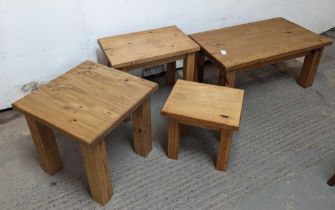 A set of four graduated, modern light oak side tab