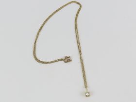 A single white stone pendant, claw set, marked '58