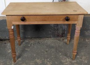 A 20th Century stripped pine rectangular side tabl