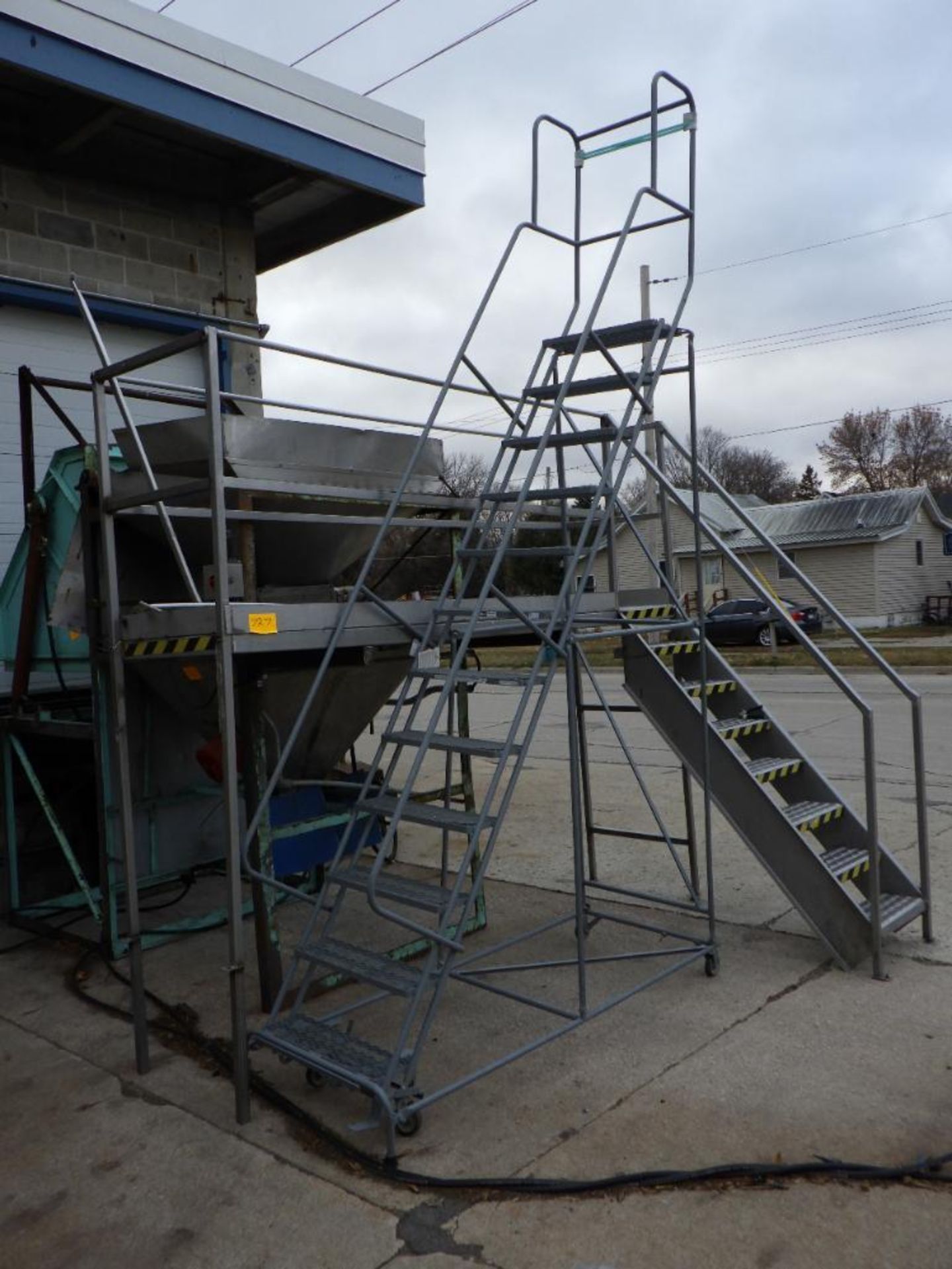 Uline 12-step rolling warehouse ladder