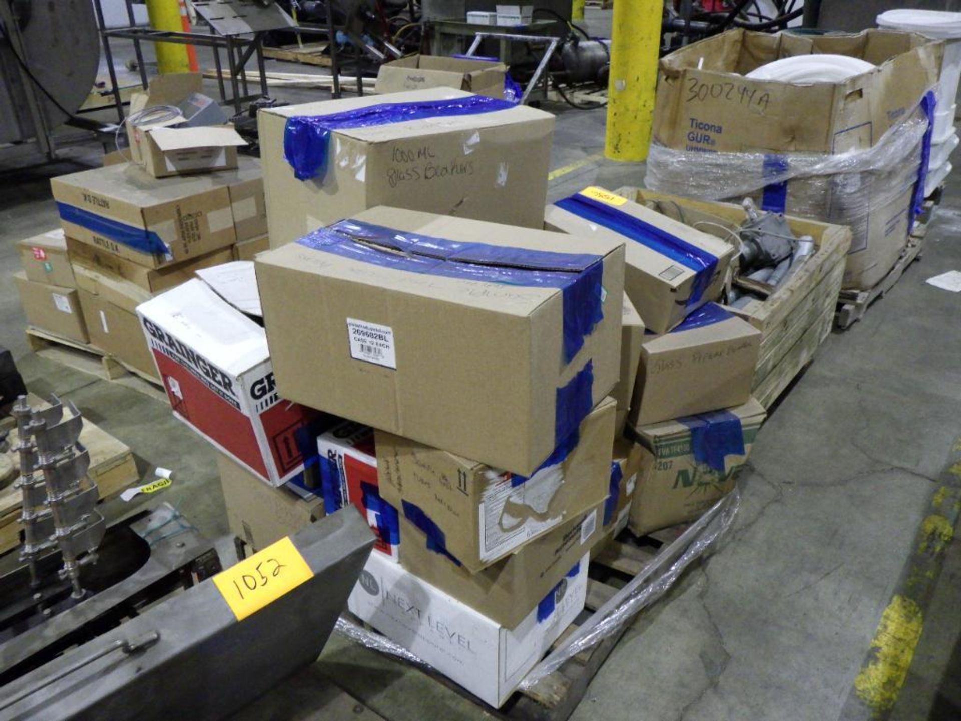 Pallet of assorted lab equipment including tube racks