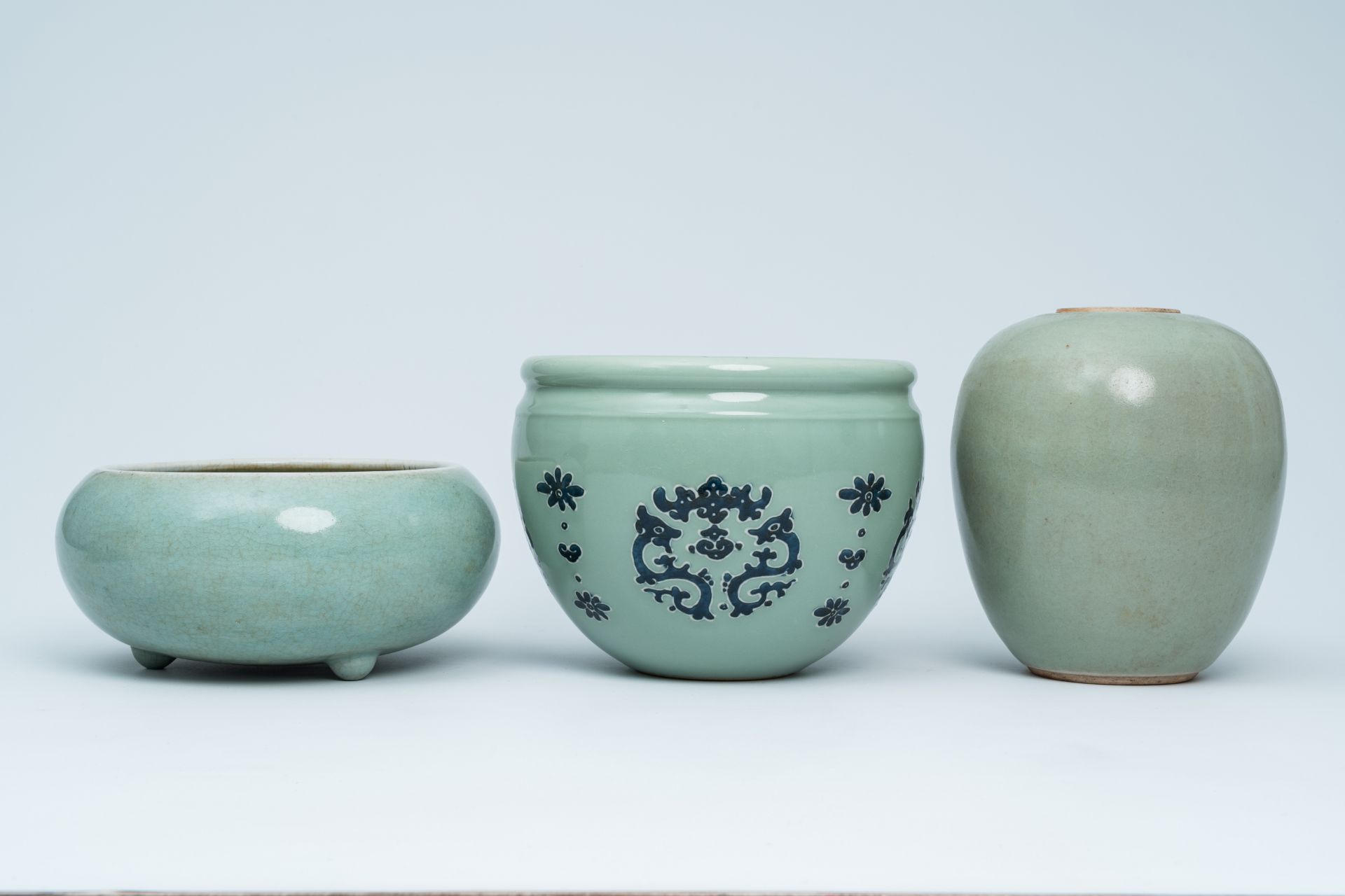 A Chinese celadon incense burner, a ginger jar and a jardiniere, 19th/20th C. - Image 3 of 7