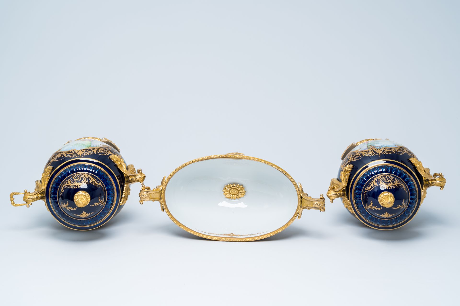A French gilt mounted blue ground gold layered three-piece garniture with lovely scenes by Lebret, S - Image 5 of 6