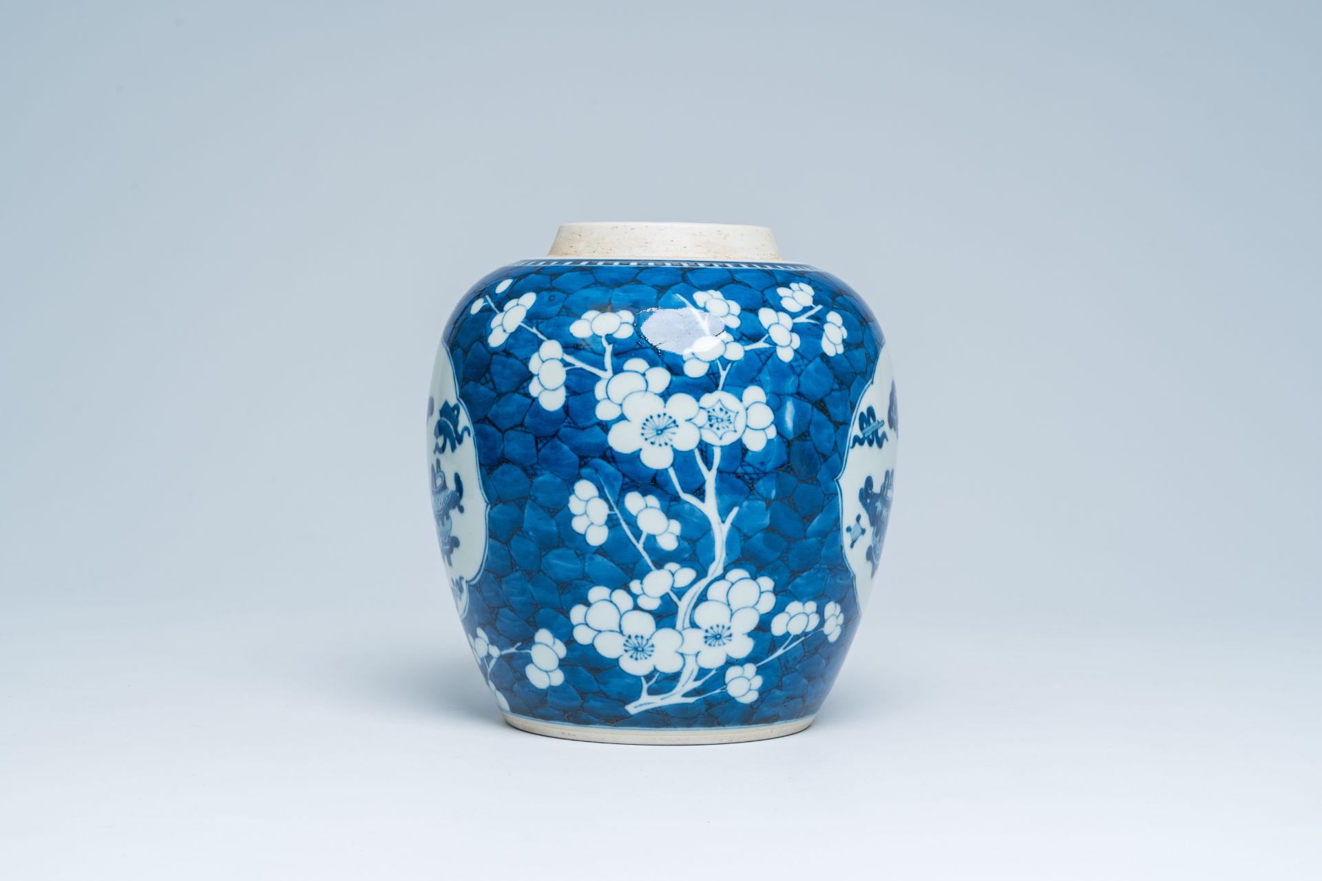 A Chinese blue and white prunus on cracked ice ground ginger jar with antiquities, 20th C. - Image 4 of 15