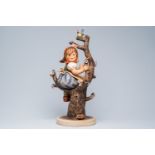 A large polychrome decorated biscuit Hummel figure, 'Apple Tree Girl', Arthur Moeller for Goebel, Ge