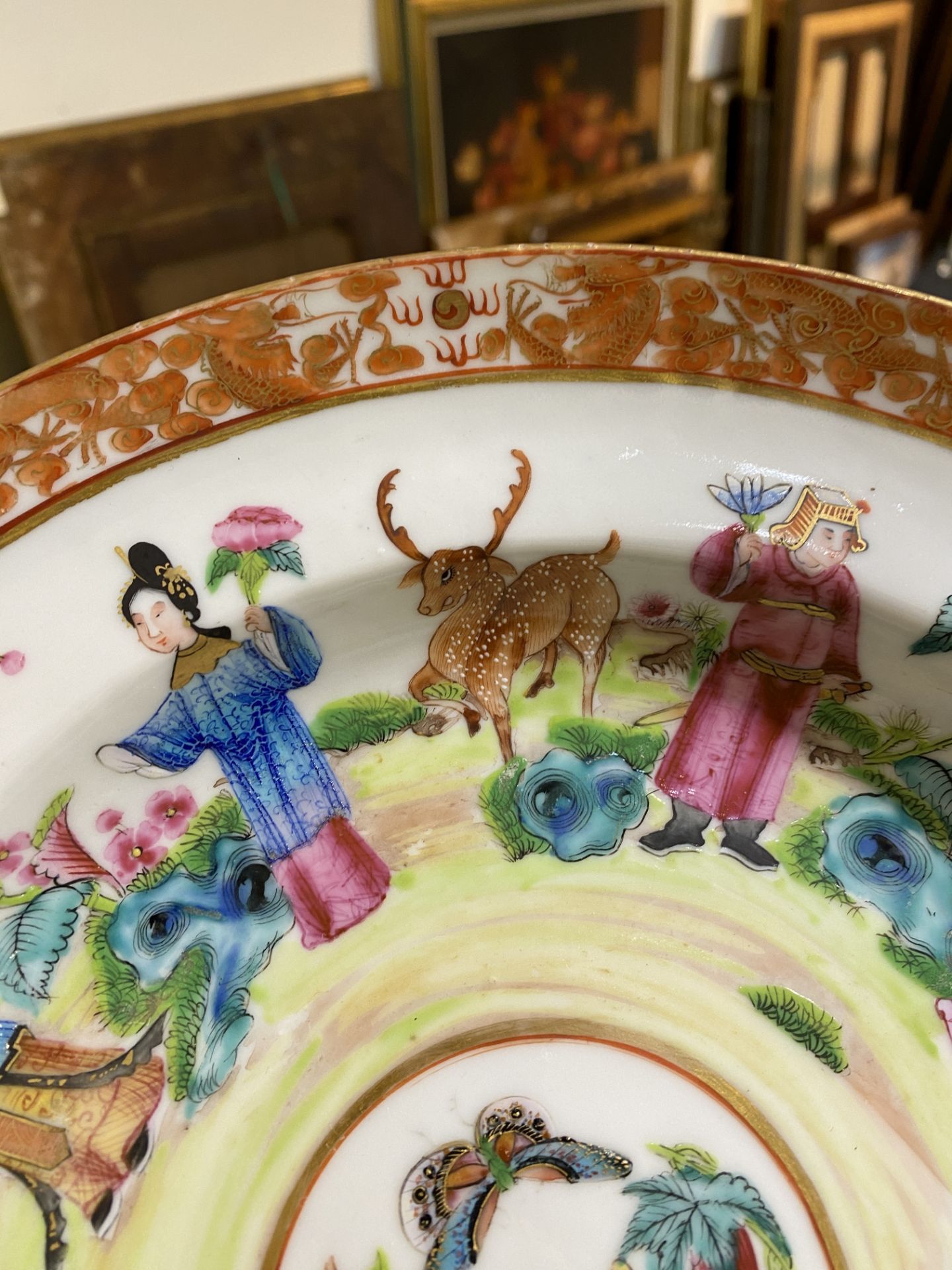 A pair of Chinese Canton famille rose 'Eight Immortals' dishes, 19th C. - Image 6 of 9