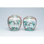 A pair of Chinese famille verte jars with lotus scrolls and figures in a landscape, 19th C.