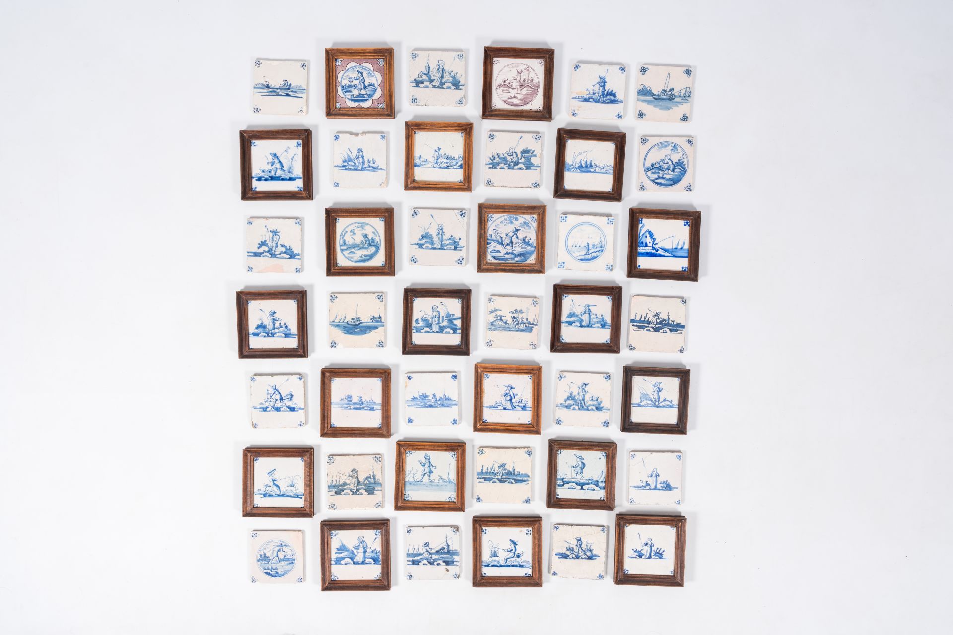 42 blue and white Dutch Delft tiles with mainly shepherds and landscapes, 18th/19th C.