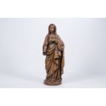 A large wood sculpture of a Madonna, 17th/18th C.