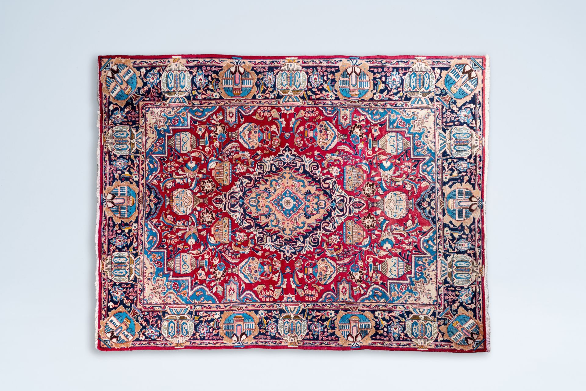 A large Iranian Kashmir rug with antiquities and floral design, wool on cotton, 20th C.