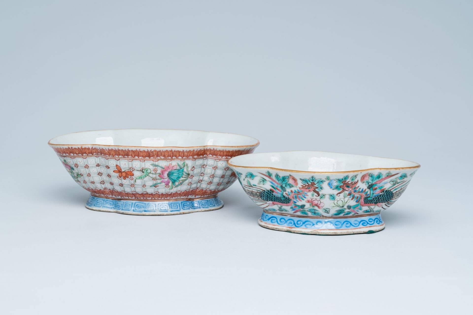 Two lobed Chinese famille rose bowls with phoenixes among blossoming branches and floral design, 19t