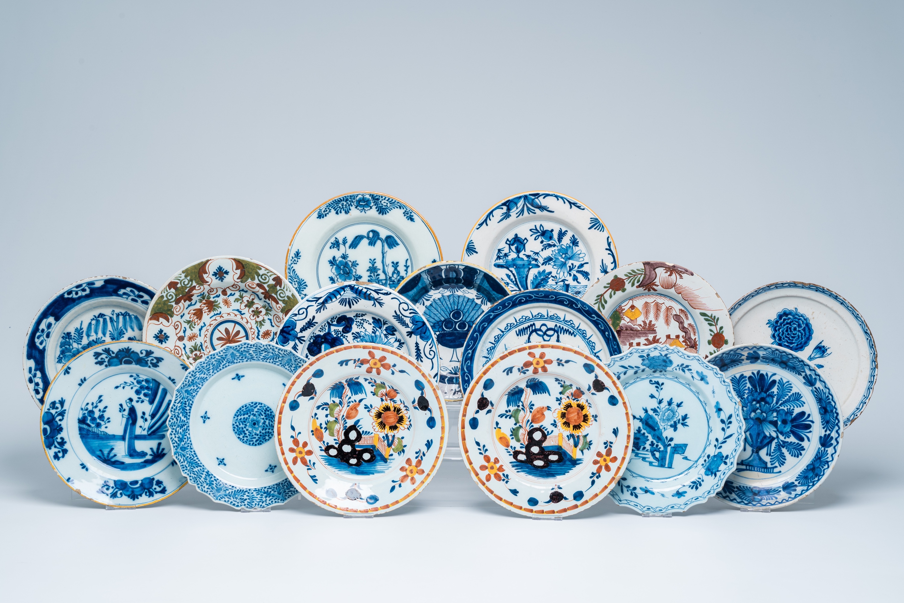 15 various blue, white and polychrome Dutch Delft plates, 18th C.