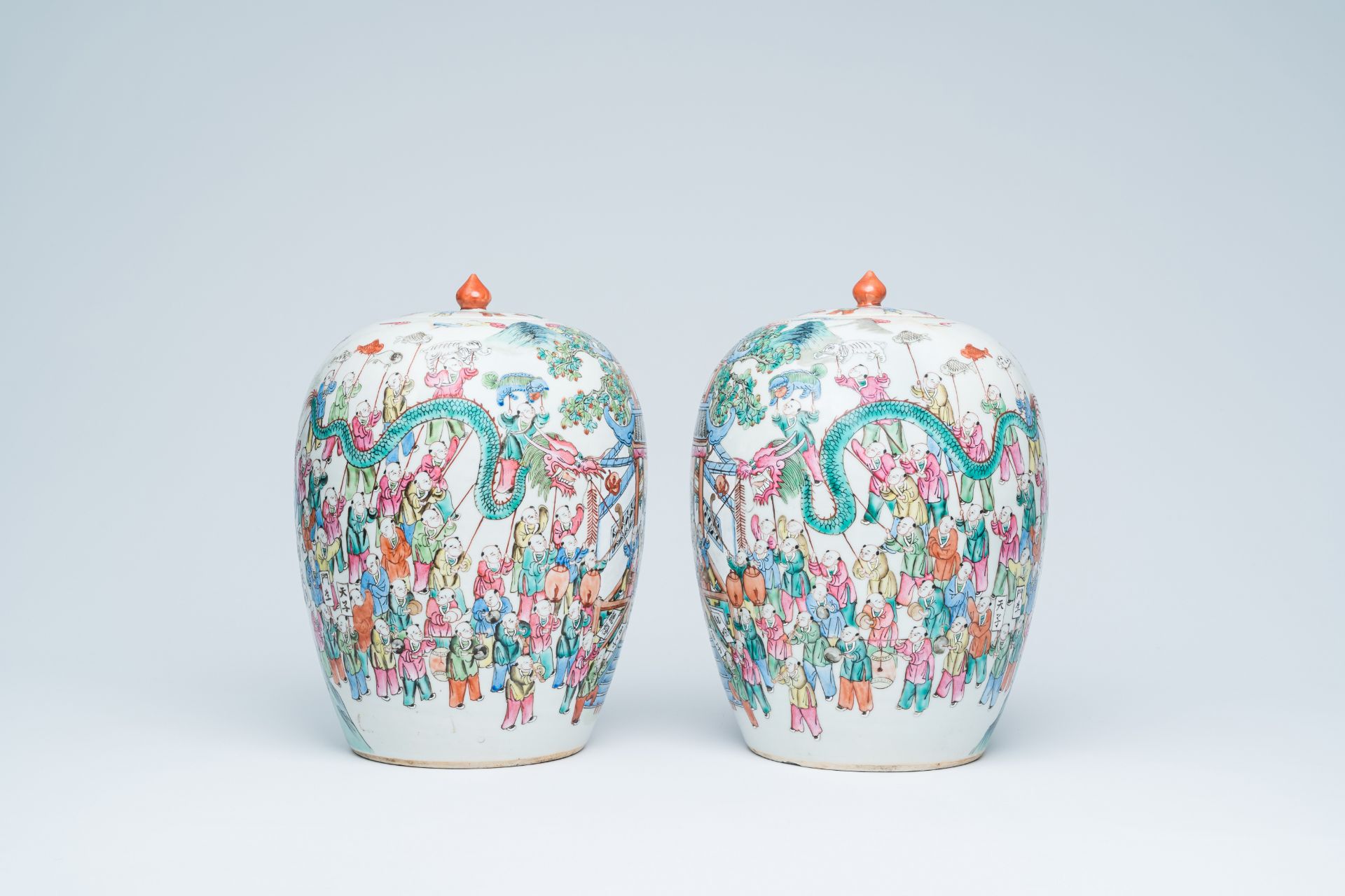A pair of Chinese famille rose '100 boys' jars and covers, 19th C. - Image 2 of 20
