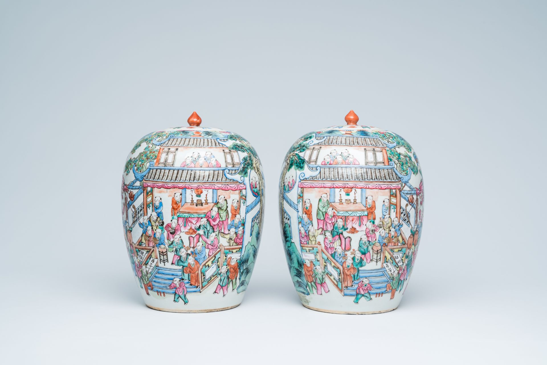 A pair of Chinese famille rose '100 boys' jars and covers, 19th C. - Image 3 of 20