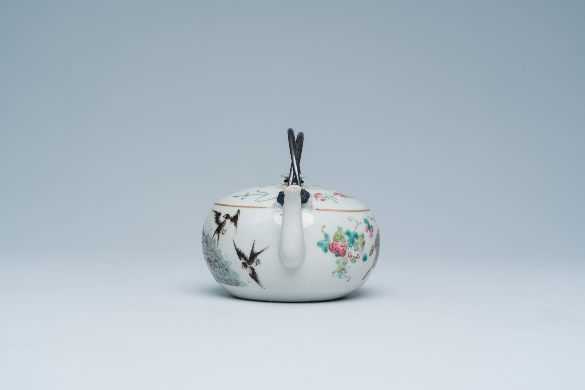 A Chinese famille rose teapot and cover with swallows and butterflies among blossoming branches, 19t - Image 6 of 21