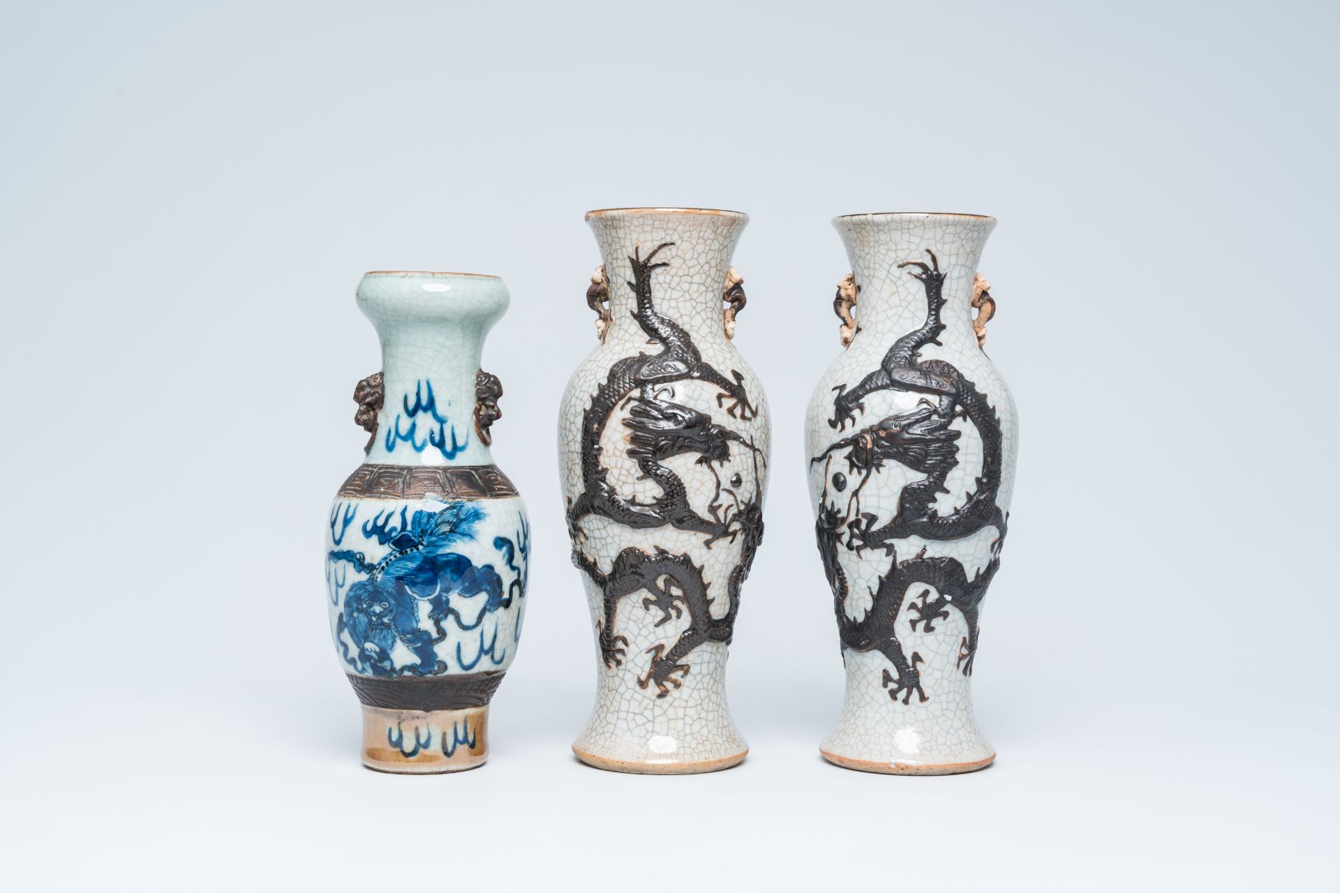 A pair of Chinese Nanking crackle glazed relief decorated 'dragon' vases and a blue and white 'Buddh - Image 2 of 16