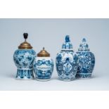 Two Dutch Delft blue and white covered vases, a tobacco jar and a lamp-mounted vase, 18th C.