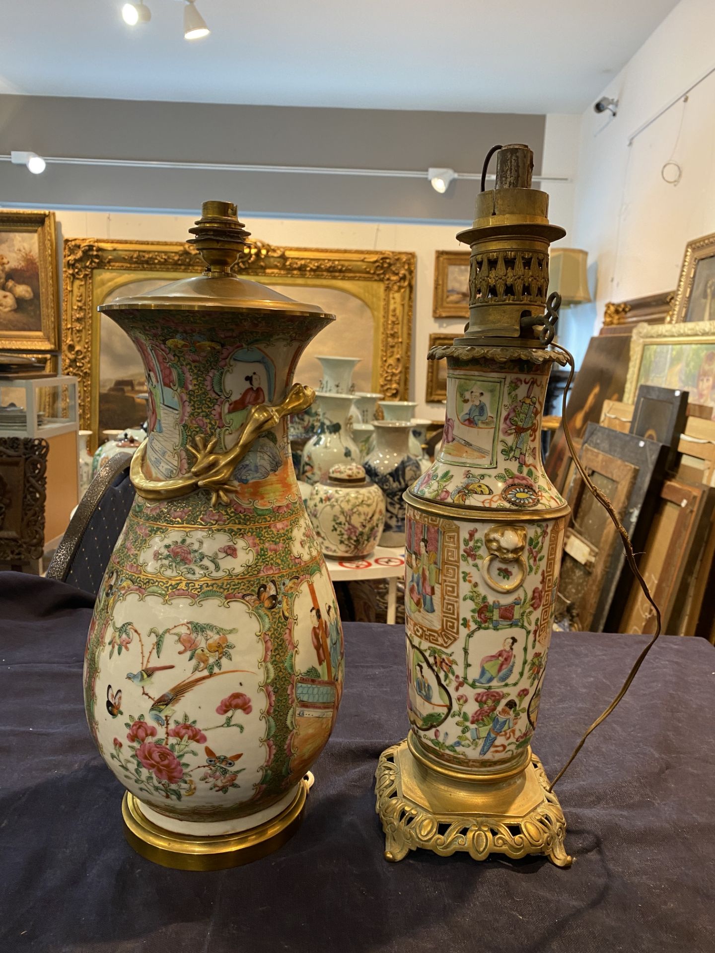 Two Chinese Canton famille rose vases with palace scenes and floral design mounted as lamps, 19th C. - Image 9 of 13