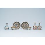 A pair of Chinese Canton famille rose cups and saucers and three vases with palace scenes and floral