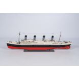 A large polychrome painted wood model of the British transatlantic ship 'Titanic', 20th C.