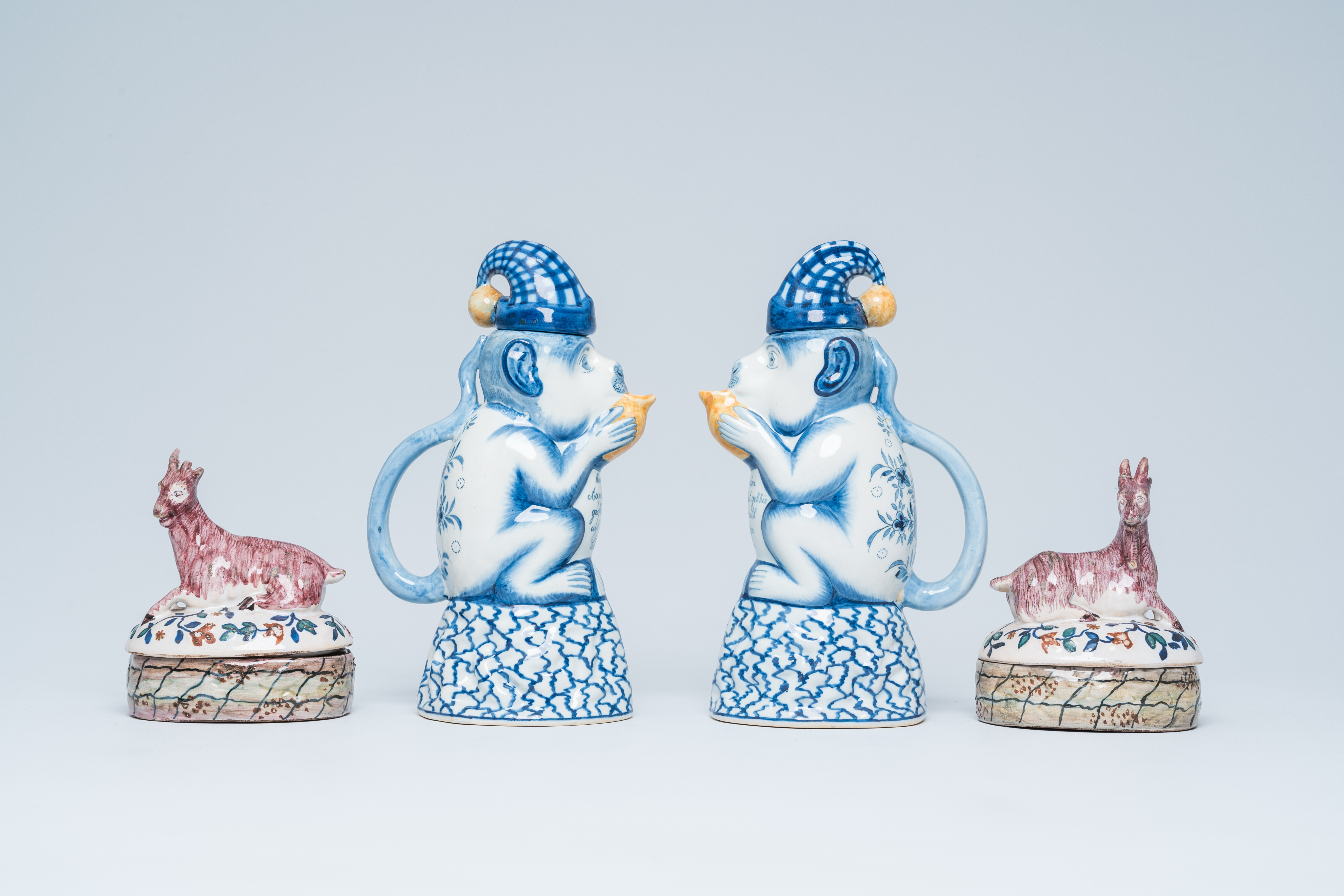 Two polychrome Dutch monkey ewers and two butter tubs with goat-shaped covers, Delft and Makkum, 19t - Image 2 of 7