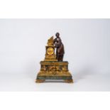 A French patinated and gilt bronze mounted vert de mer marble mantel clock crowned with Saint Cecili