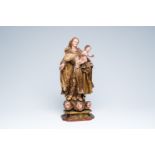 A Flemish polychromed wood sculpture of the Madonna with Child, 17th/18th C.