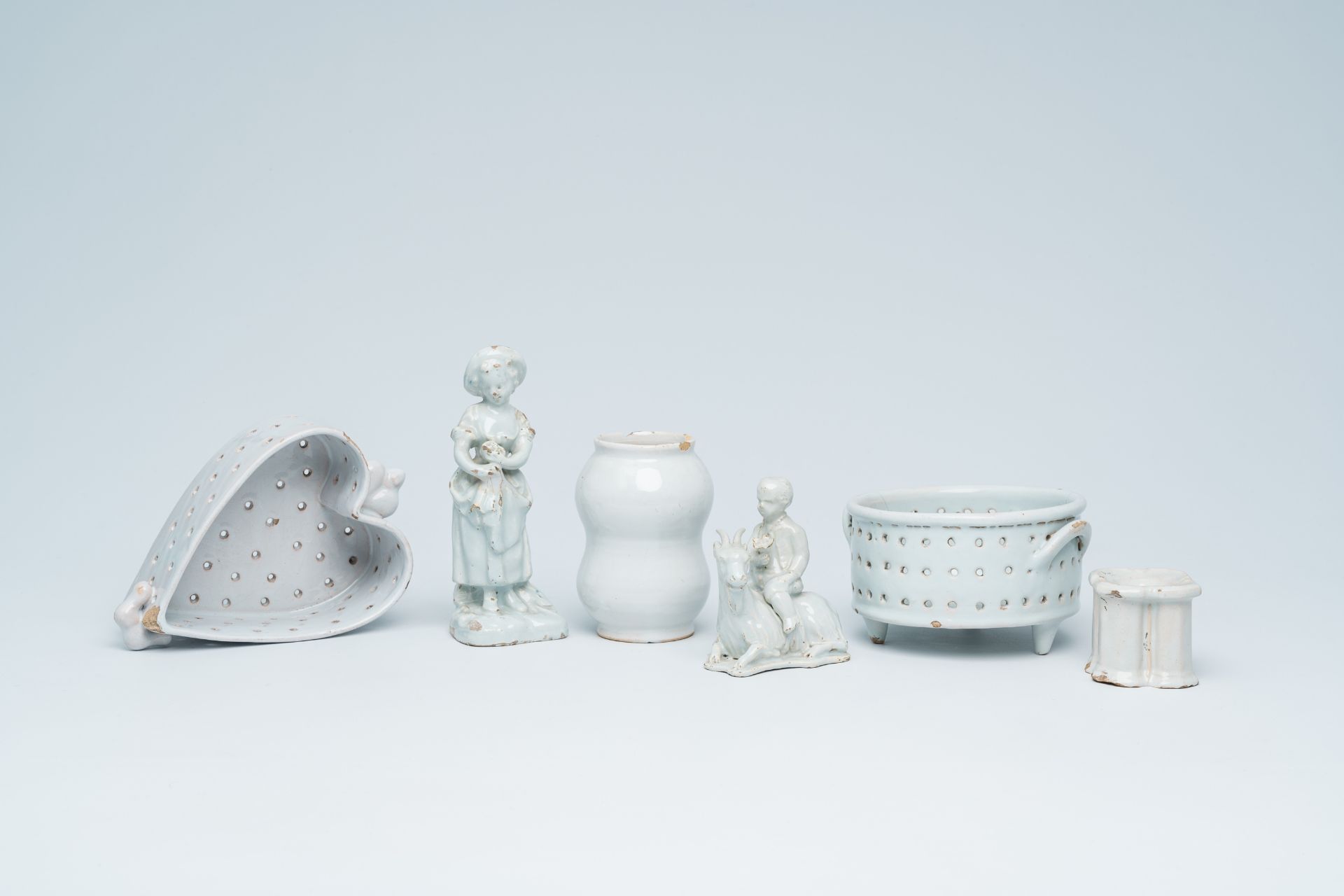 Six monochrome white Delftware pieces, The Netherlands and France, 18th/19th C.