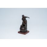 Rudolf Marcuse (1878-1940): Lady with a kettle, patinated bronze on a red marble base, foundry mark