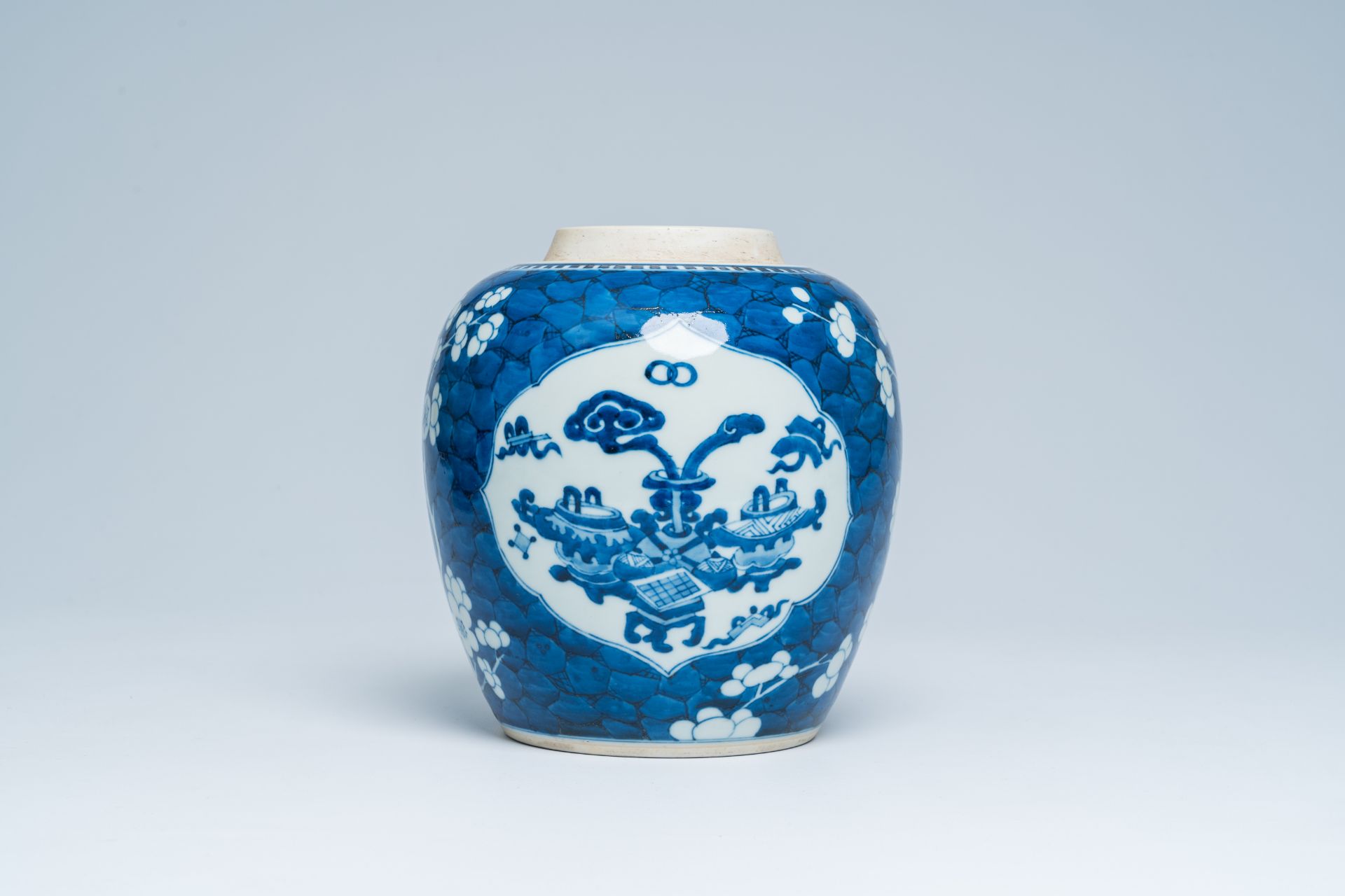 A Chinese blue and white prunus on cracked ice ground ginger jar with antiquities, 20th C. - Image 3 of 15