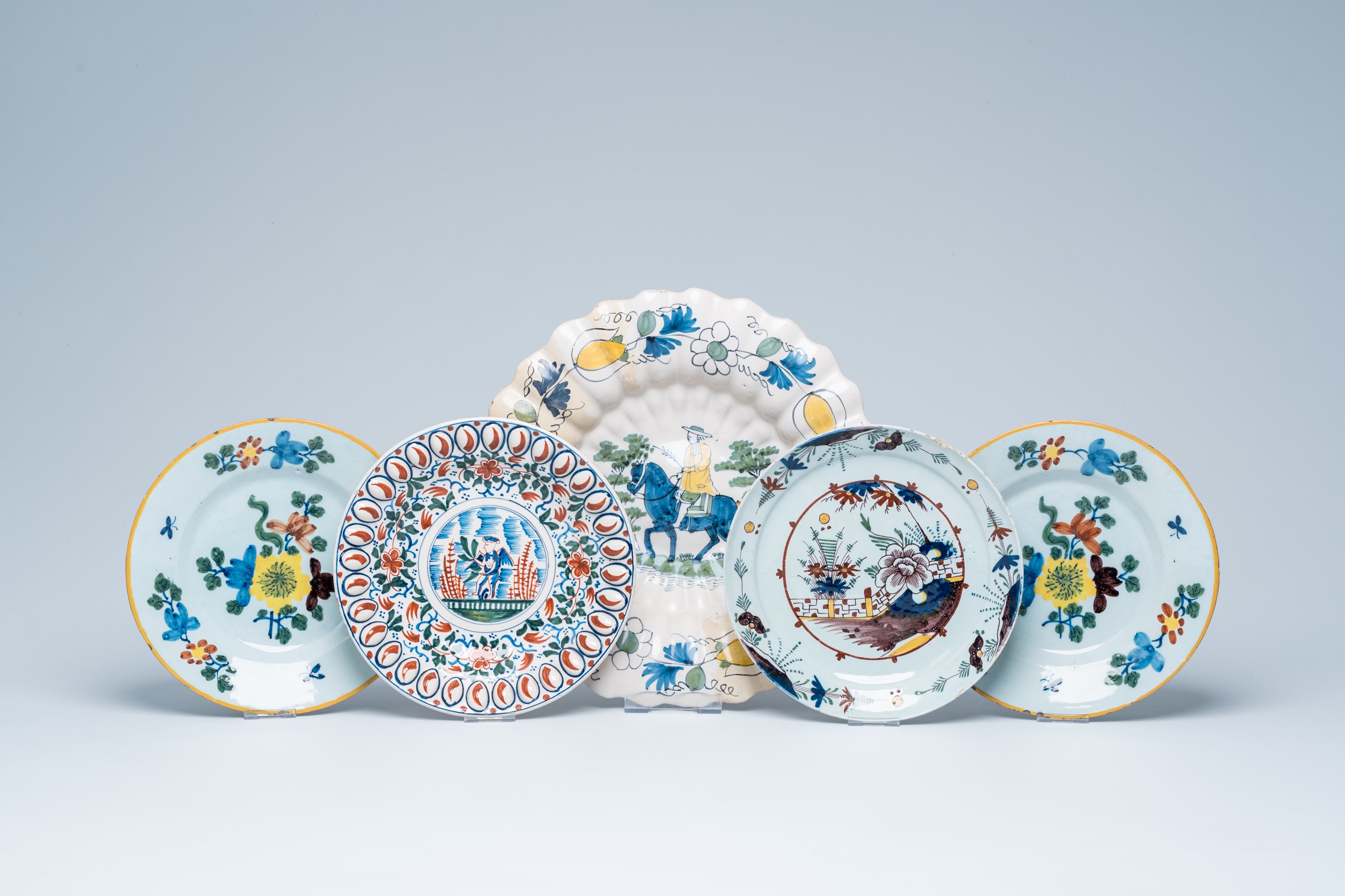 Five polychrome Delft dishes, England and The Netherlands, 18th C.