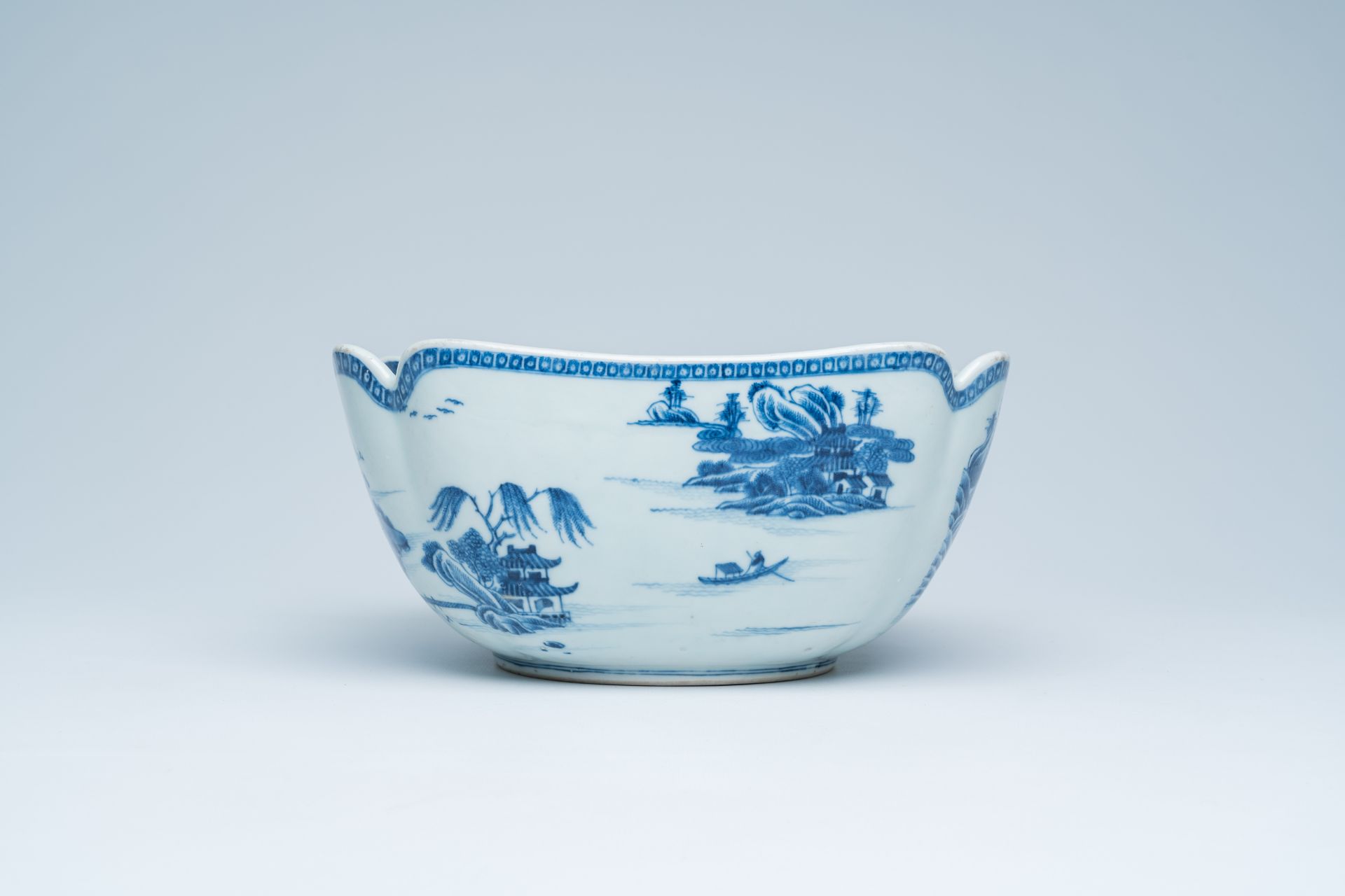 A Chinese blue and white salad bowl with an animated river landscape, 19th C. - Image 6 of 17