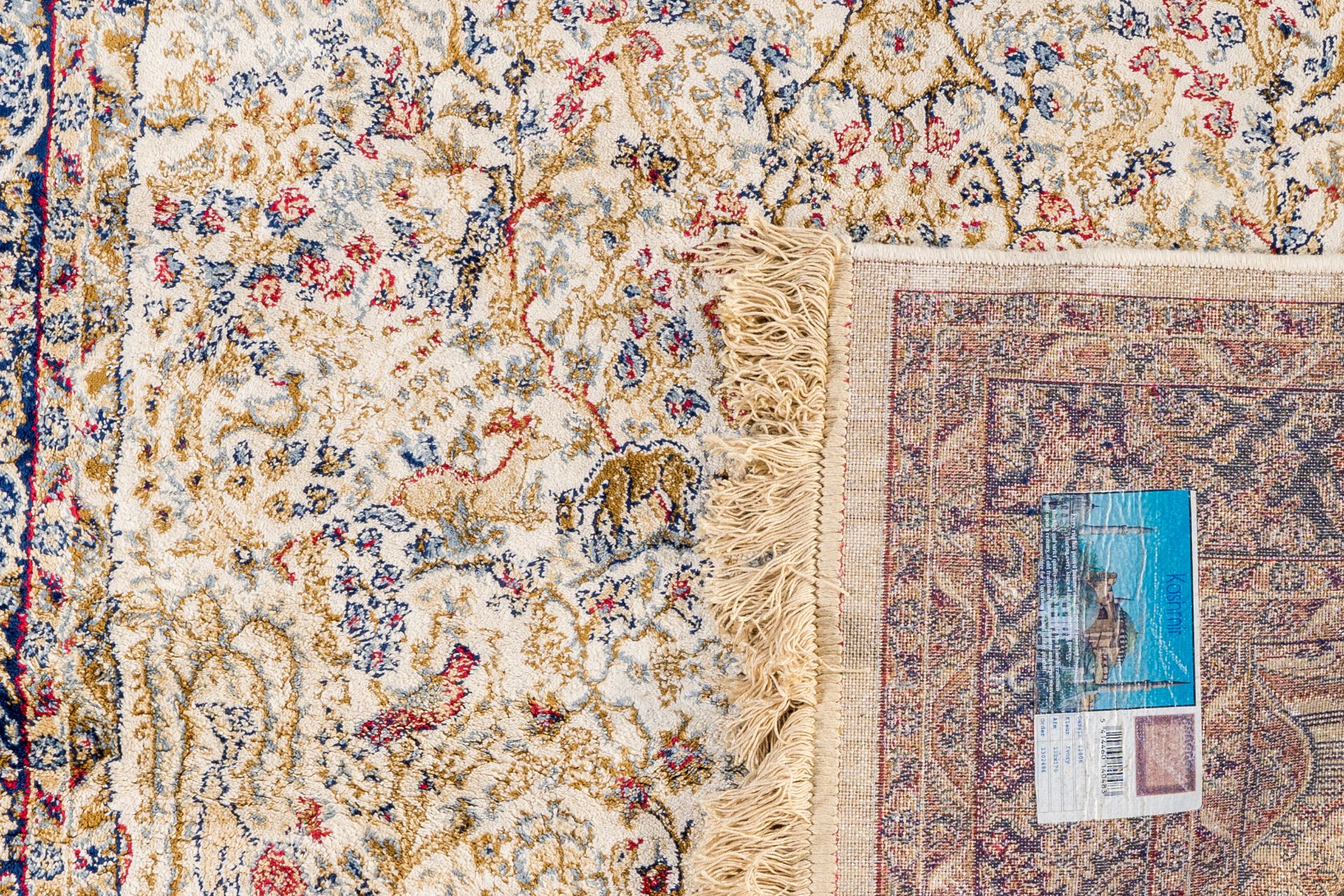 A pair of Iranian Kashmir rugs with birds among blossoming branches, silk on cotton, 20th C. - Image 2 of 2