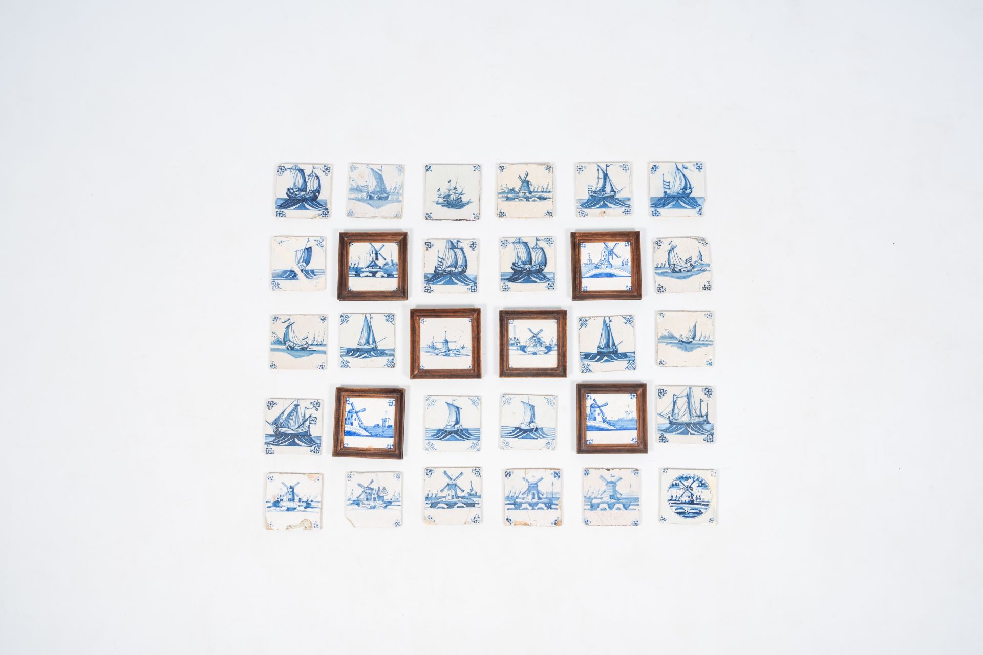 30 blue and white Dutch Delft tiles with boats and windmills, 18th/19th C.