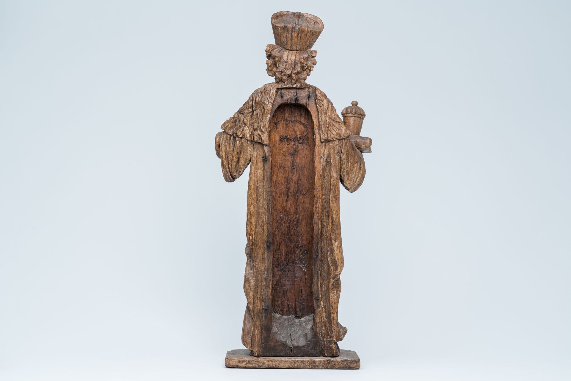 A large wood sculpture of Saint Damian holding a book and an ointment jar, Central Europe, 17th C. - Image 4 of 7